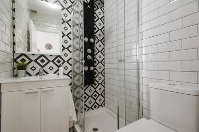 Un baño de Urban Pulses Alameda Jacuzzi Privado