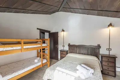 Cama o camas de una habitación en Casa Rural San Miguel