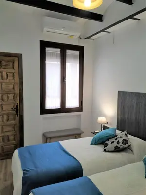 Cama o camas de una habitación en Entre patios y flores
