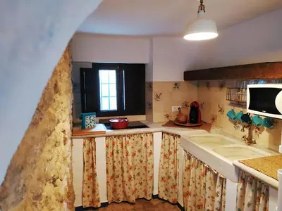 Una cocina o zona de cocina en El escondite de Martina, Casa Rural Romántica