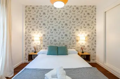 Cama o camas de una habitación en Veoapartment Alhóndiga Segundo