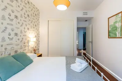 Cama o camas de una habitación en Veoapartment Alhóndiga Segundo