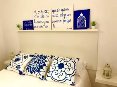 Cama o camas de una habitación en Alojamiento turístico La Orilla Izquierda