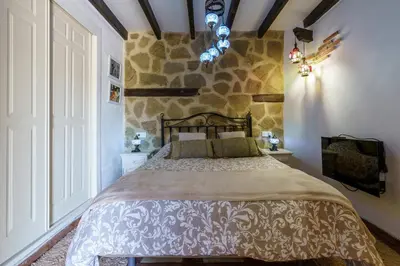 Cama o camas de una habitación en Casa Nazarí - Setenil de las Bodegas