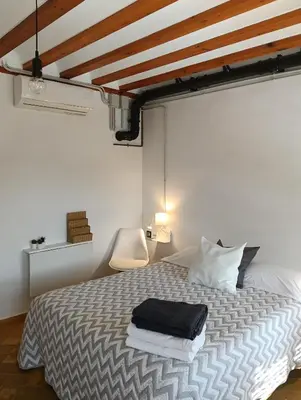 Cama o camas de una habitación en Corredera Travel 4