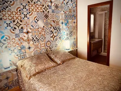 Cama o camas de una habitación en Apartamentos Ruz