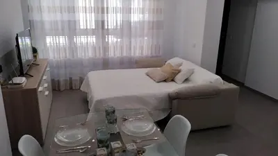 Una televisión o centro de entretenimiento en Loft Abril