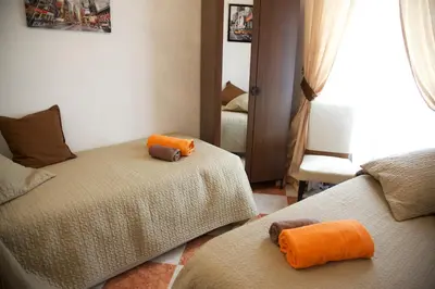 Cama o camas de una habitación en Apartamentos Plaza de Austria