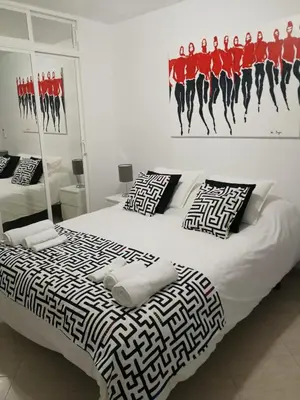 Cama o camas de una habitación en Sol Centro Apartment A