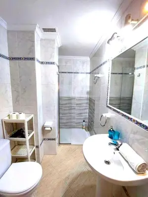 Un baño de Sol Centro Apartment A