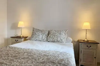 Cama o camas de una habitación en Historia y Tradición - Sevilla desde dentro.