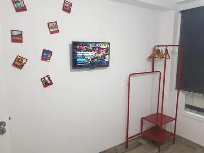 Una televisión o centro de entretenimiento en Mezquita- Elite, Parking, Wifi