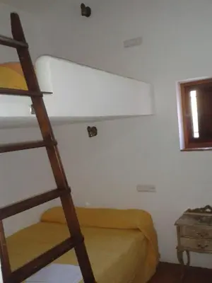 Cama o camas de una habitación en Cortijo Nuevo Alojamiento Rural