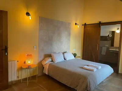 Cama o camas de una habitación en FINCA LAS DEHESILLAS