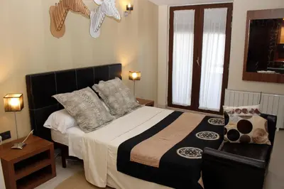 Cama o camas de una habitación en Palacete Maria Rosa