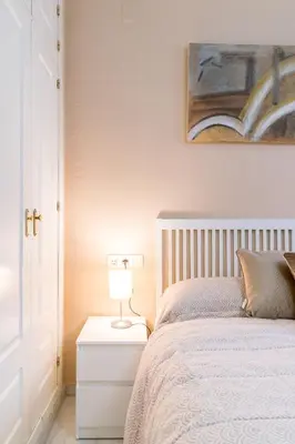 Cama o camas de una habitación en Céntrico II Donkey Parking incluido
