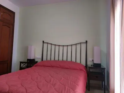 Cama o camas de una habitación en Vivienda Turística Ronda del Carmen