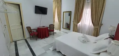 Una televisión o centro de entretenimiento en Apartamento Tendillas