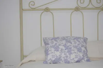 Cama o camas de una habitación en Santa Angela de la Cruz