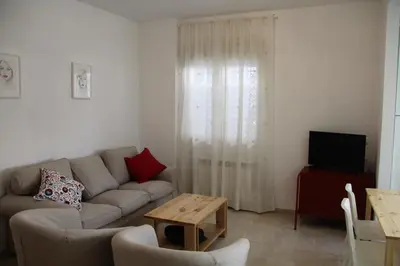 Una televisión o centro de entretenimiento en Apartamento Iris