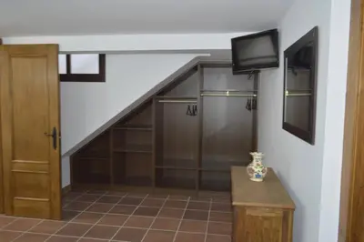 Una televisión o centro de entretenimiento en Villa Rosales