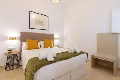 Cama o camas de una habitación en MuMu Luxury Suite Lirio
