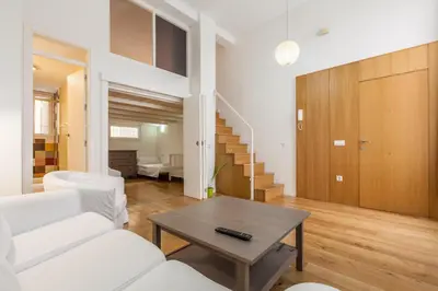 Zona de estar de Fantástico Duplex 2 hab 4 px -WIFI AC