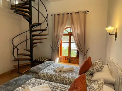 Cama o camas de una habitación en Hacienda La Trinidad