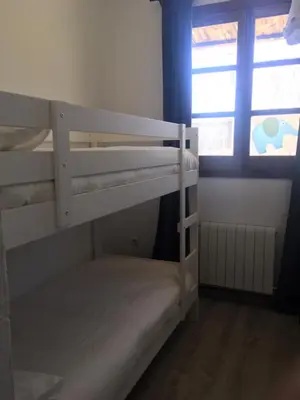 Cama o camas de una habitación en La Cobacha