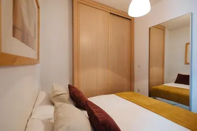 Cama o camas de una habitación en Calatrava Suite Apartment