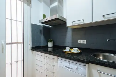 Una cocina o zona de cocina en Feijóo Suite Apartment