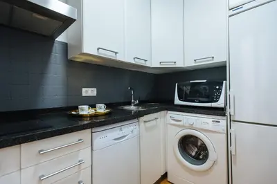Una cocina o zona de cocina en Feijóo Suite Apartment
