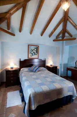 Cama o camas de una habitación en El Cortijo at Molino la Ratonera