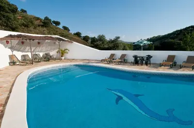 Piscina en o cerca de El Cortijo at Molino la Ratonera