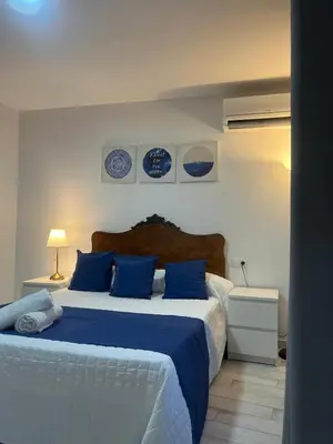 Cama o camas de una habitación en Casa Puerta de la Alcazaba Antequera