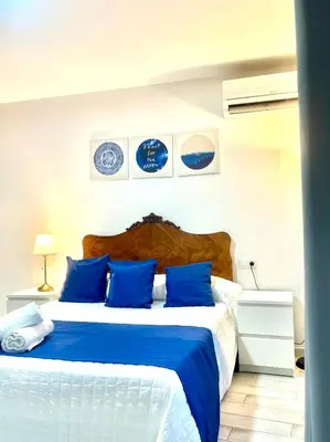 Cama o camas de una habitación en Casa Puerta de la Alcazaba Antequera