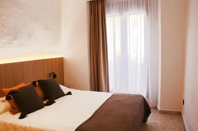 Cama o camas de una habitación en LA ALMACERÍA DE ANTEQUERA
