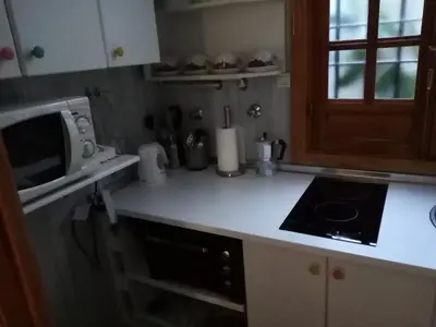 Una cocina o zona de cocina en Comfortable Apartment in Central Córdoba, 42 m², Parking.