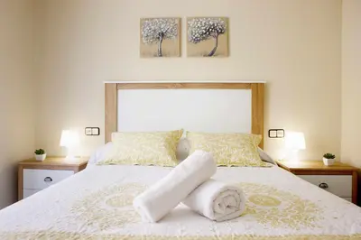 Cama o camas de una habitación en MESONES - PARKING GRATIS - CLIMATIZADO