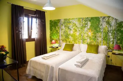 Cama o camas de una habitación en Palacio Sirvente Mieres - PARKING GRATUITO