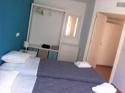 Cama o camas de una habitación en Corazón de Nervión, excelente ubicación, opcion PARKING