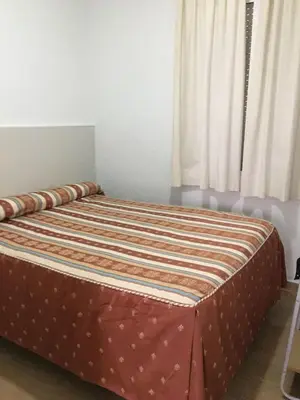 Cama o camas de una habitación en Hostal VILLA CARBULA