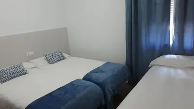 Cama o camas de una habitación en Hostal VILLA CARBULA