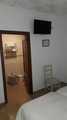 Una televisión o centro de entretenimiento en Hostal VILLA CARBULA