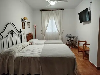 Cama o camas de una habitación en Alojamiento Árdales