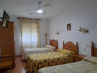Cama o camas de una habitación en Alojamiento Árdales