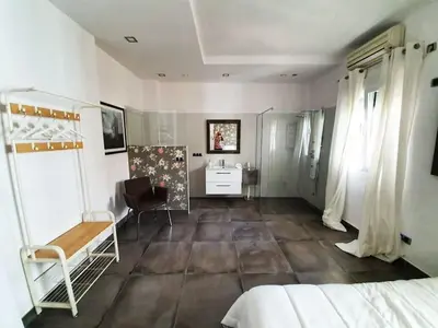 Cama o camas de una habitación en El Patio de San Bernardo