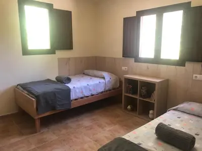 Cama o camas de una habitación en Casa de Campo Patricia