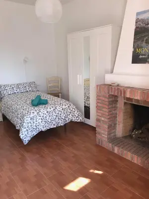 Cama o camas de una habitación en GRAN CASA RURAL CON PATIO EN ENCINAREJO DE CÓRDOBA