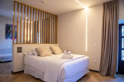 Cama o camas de una habitación en Palacio San Fernando